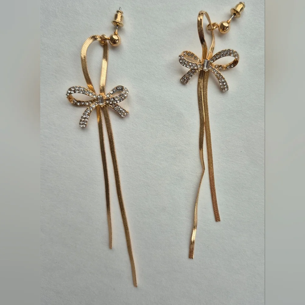 Long Ribbon Bow Pierced Earrings. - Picture 1 of 9